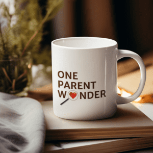 "One Parent Wonder" mug on a book in a cozy setting.