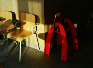 Empty daycare classroom highlighting childcare system strain
